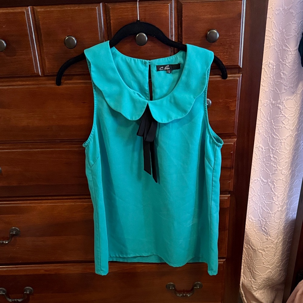 C. Luce Sleeveless Blouse with Black Bow Peter Pan collar